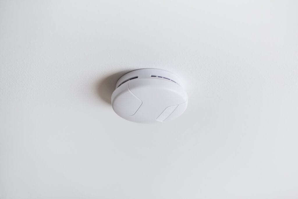 A smoke detector on the ceiling - a home's safety feature